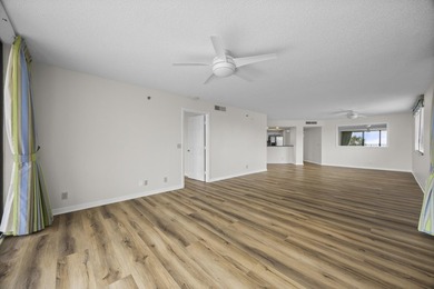 RARE 3 BEDROOM/2BATH CORNER UNIT WITH TWO GARAGES! Step inside - photo 7