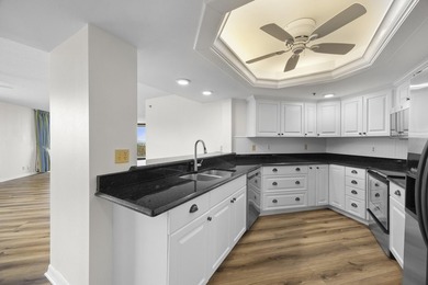 RARE 3 BEDROOM/2BATH CORNER UNIT WITH TWO GARAGES! Step inside - photo 9