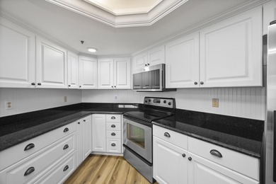 RARE 3 BEDROOM/2BATH CORNER UNIT WITH TWO GARAGES! Step inside - photo 10