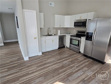 New 2026 shaker white cabinets, stainless new fridge, new - photo 3