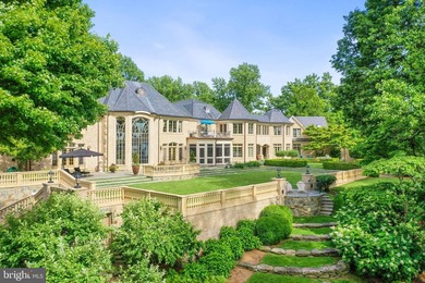This extraordinary gated 20-acre waterfront estate, featuring a - photo 2