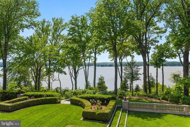 This extraordinary gated 20-acre waterfront estate, featuring a - photo 3