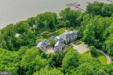 This extraordinary gated 20-acre waterfront estate, featuring a - photo 4