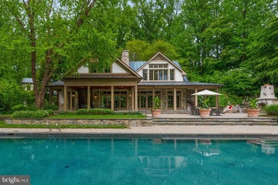This extraordinary gated 20-acre waterfront estate, featuring a - photo 9