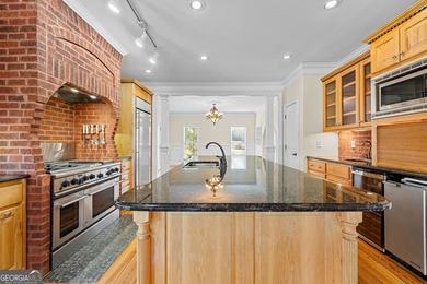 Welcome to this exceptional four-sided brick estate nestled on - photo 27