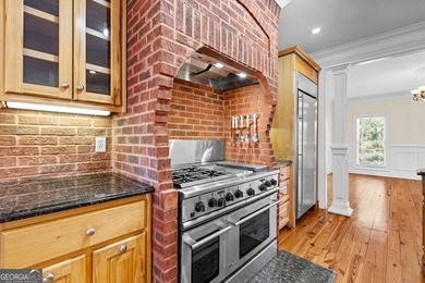 Welcome to this exceptional four-sided brick estate nestled on - photo 29