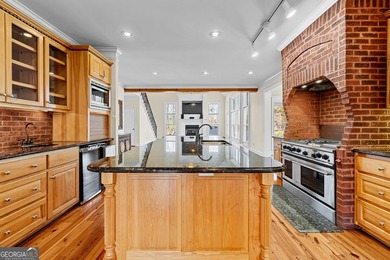 Welcome to this exceptional four-sided brick estate nestled on - photo 30