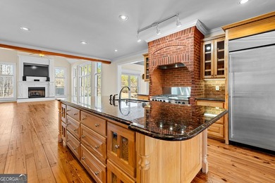 Welcome to this exceptional four-sided brick estate nestled on - photo 31