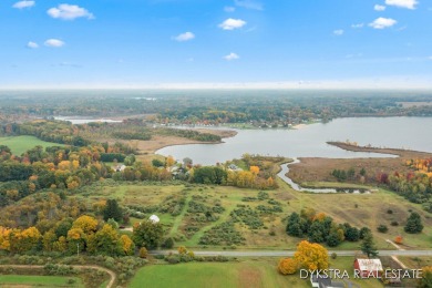 Lake Acreage For Sale in Cedar Springs, Michigan