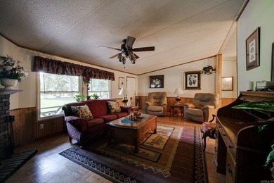Enjoy lakefront living with this 3 bedroom, 2 bath home, sitting - photo 11