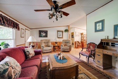 Enjoy lakefront living with this 3 bedroom, 2 bath home, sitting - photo 12