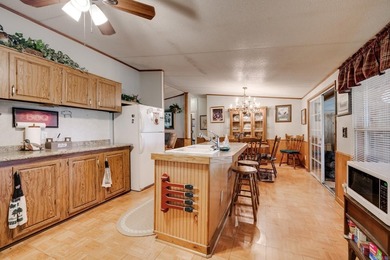 Enjoy lakefront living with this 3 bedroom, 2 bath home, sitting - photo 16