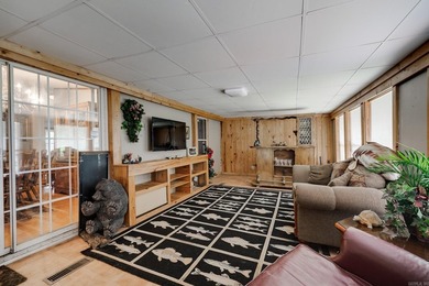 Enjoy lakefront living with this 3 bedroom, 2 bath home, sitting - photo 18