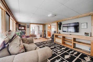 Enjoy lakefront living with this 3 bedroom, 2 bath home, sitting - photo 20