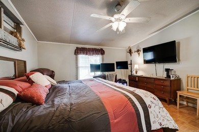 Enjoy lakefront living with this 3 bedroom, 2 bath home, sitting - photo 22