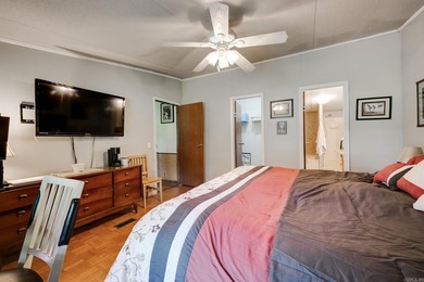 Enjoy lakefront living with this 3 bedroom, 2 bath home, sitting - photo 23