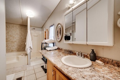 Enjoy lakefront living with this 3 bedroom, 2 bath home, sitting - photo 24