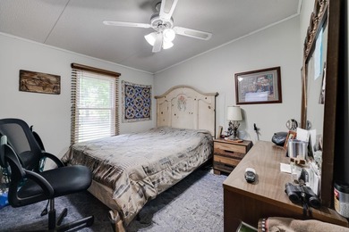 Enjoy lakefront living with this 3 bedroom, 2 bath home, sitting - photo 25