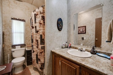 Enjoy lakefront living with this 3 bedroom, 2 bath home, sitting - photo 26
