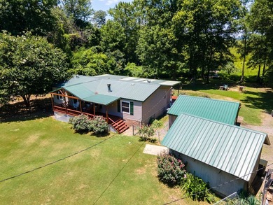 Enjoy lakefront living with this 3 bedroom, 2 bath home, sitting - photo 27