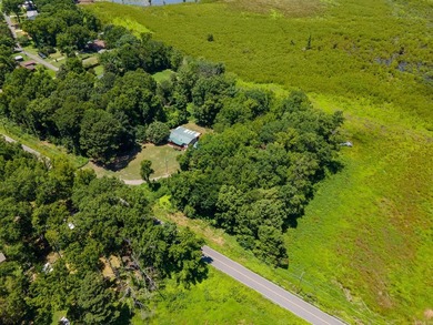 Enjoy lakefront living with this 3 bedroom, 2 bath home, sitting - photo 32