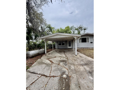 Unlock the potential in this 2 bedroom, 2 bath with a flex room - photo 2