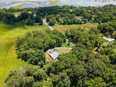 Enjoy lakefront living with this 3 bedroom, 2 bath home, sitting - photo 35