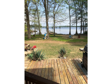 Enjoy lakefront living with this 3 bedroom, 2 bath home, sitting - photo 38