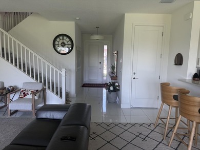 Welcome to this exceptional two-story residence, nestled within - photo 5