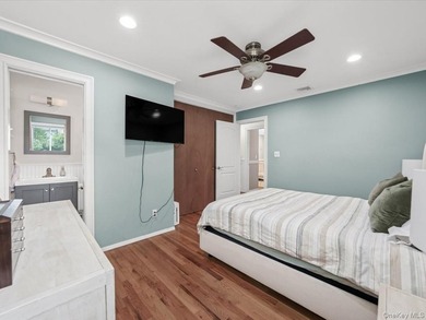 Welcome to 66 Moffitt Boulevard, a spacious three-bedroom - photo 14