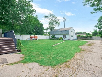 Welcome to 66 Moffitt Boulevard, a spacious three-bedroom - photo 21