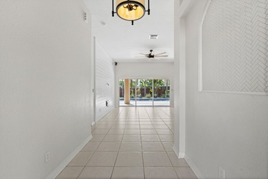 Florida living shines in this beautifully maintained pool home - photo 4