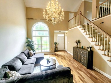 Step into this beautiful home with cathedral ceiling in the - photo 3