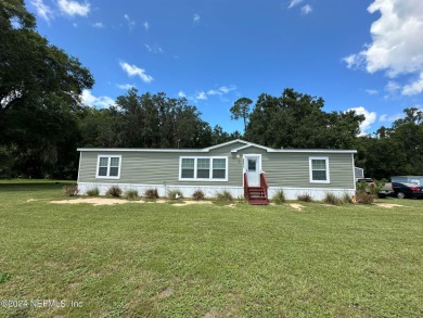 Lake Home For Sale in Starke, Florida