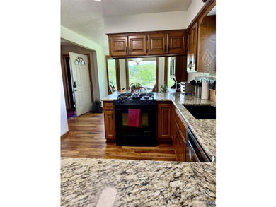 Price improved on this Stunning Lake Ridge Estates home situated - photo 8