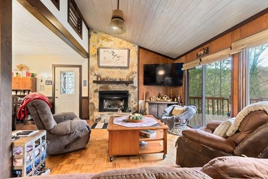 Tucked away on a peaceful cove of Lake Hiwassee in the - photo 16