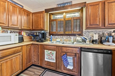 Tucked away on a peaceful cove of Lake Hiwassee in the - photo 21