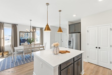 Brand new and move-in ready in Anchors Bend Townes. This