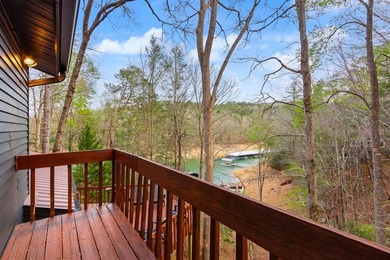 Tucked away on a peaceful cove of Lake Hiwassee in the - photo 44