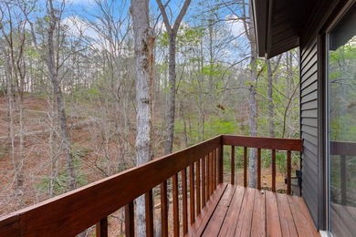 Tucked away on a peaceful cove of Lake Hiwassee in the - photo 45