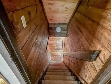 Tucked away on a peaceful cove of Lake Hiwassee in the - photo 49