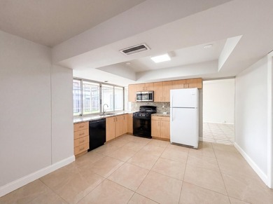 Experience 7141 Harbour Blvd, recently enhanced with fresh - photo 2