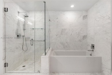 Live in one of Miami's most coveted boutique buildings in the - photo 9