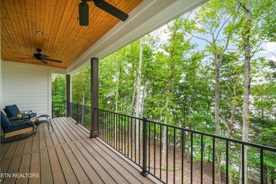 Lakefront home situated on over an acre in a serene wooded - photo 5