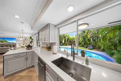 Step into tropical living in the heart of Imperial Point. This - photo 22