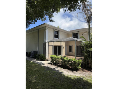 Welcome to this charming three-bedroom, three-bathroom townhouse - photo 1