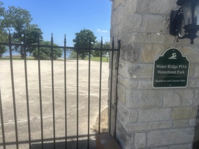 The lot is in a locked develoopment. It has electricity and - photo 22