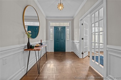 Welcome to this beautifully maintained traditional brick ranch