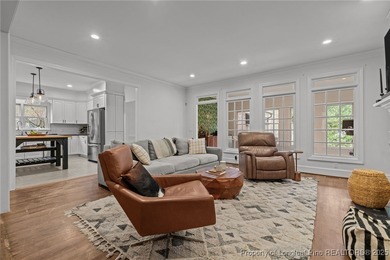 Welcome to this beautifully maintained traditional brick ranch