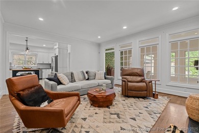 Welcome to this beautifully maintained traditional brick ranch